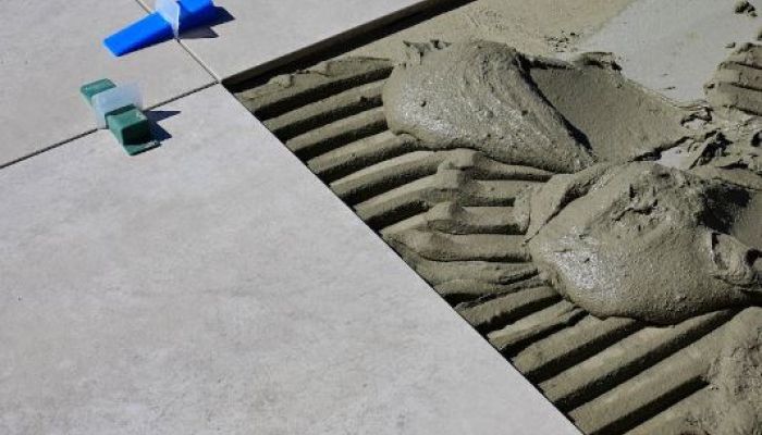 Étanchéité sous carrelage : la protection indispensable des pièces humides